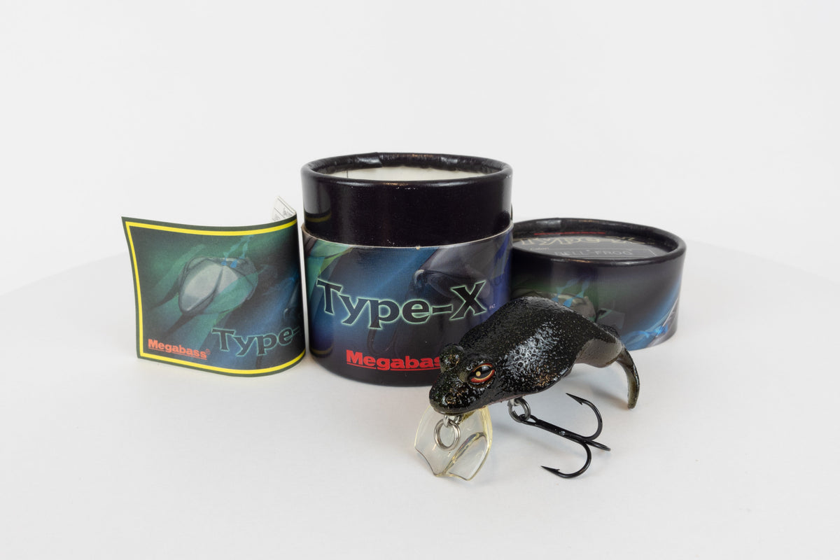 Megabass Type-X - 2005 model - Bell Frog colour - Discontinued rare fishing lure, new in original packaging. Front view of lure next to packaging and paper insert. 