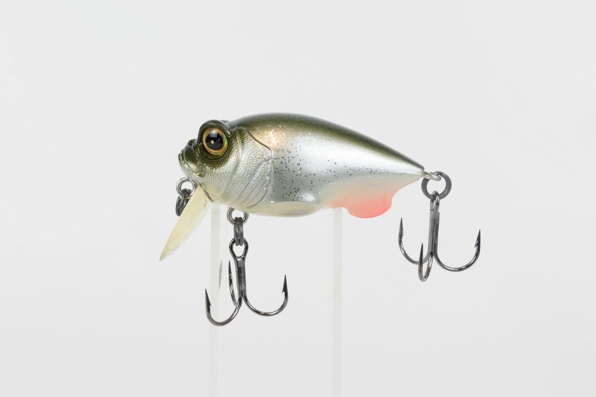 Megabass Griffon Zero - 2003 model - Glitter Shad - discontinued fishing lure new in original packaging - left side view of lure. 