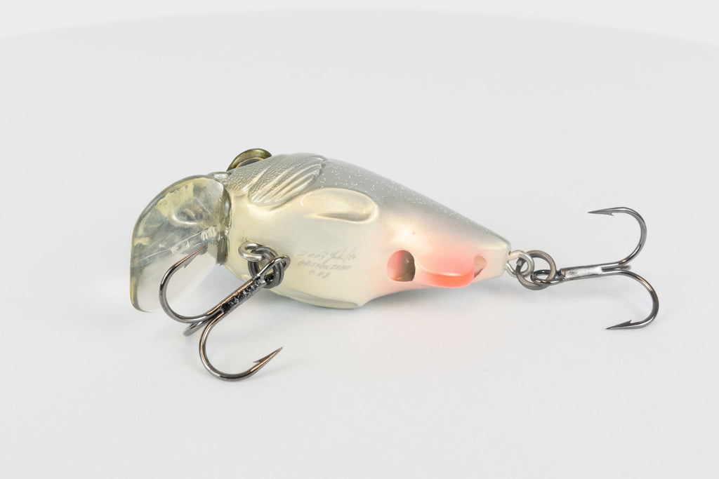 Megabass Griffon Zero - 2003 model - Glitter Shad - discontinued fishing lure new in original packaging - belly view of lure with model stamping. 