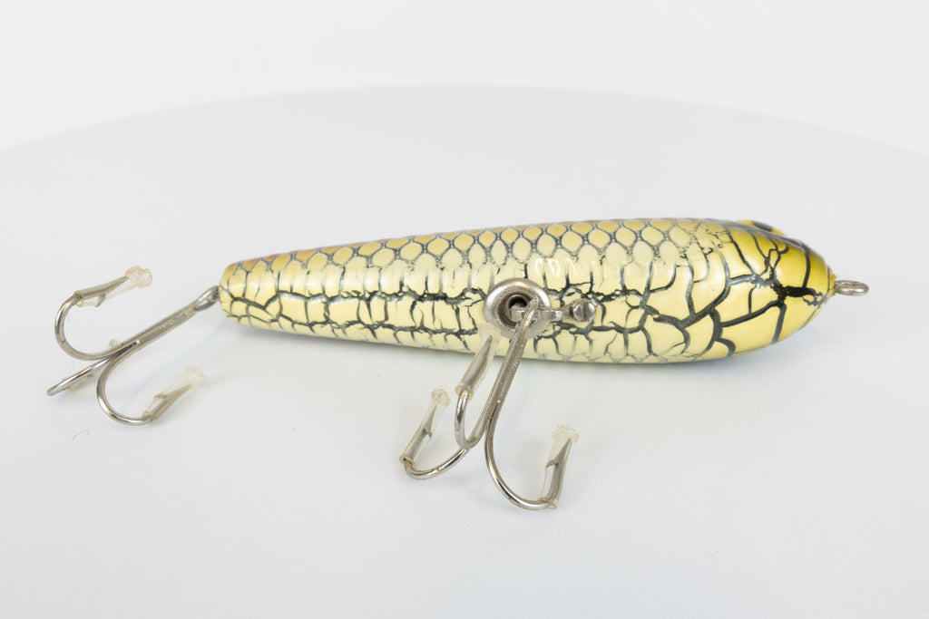 Bloodshot Raptor - Handmade Japanese Pencil Bait - Snake Skin pattern, new in original packaging, belly view of fishing lure. 
