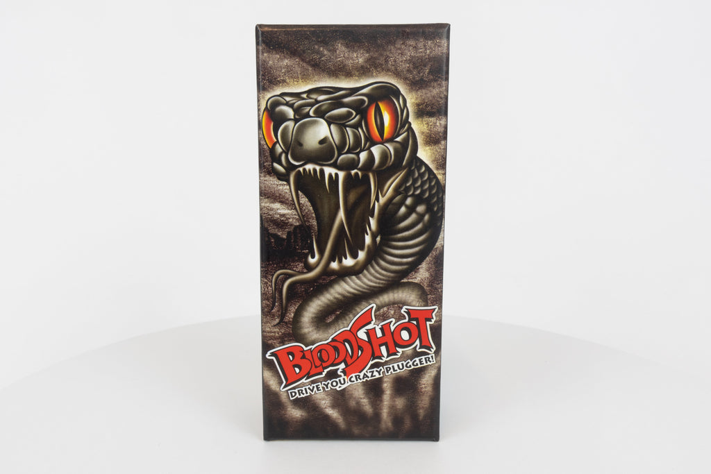 Bloodshot Raptor - Handmade Japanese Pencil Bait - Snake Skin pattern, new in original packaging, front view of packaging box. 