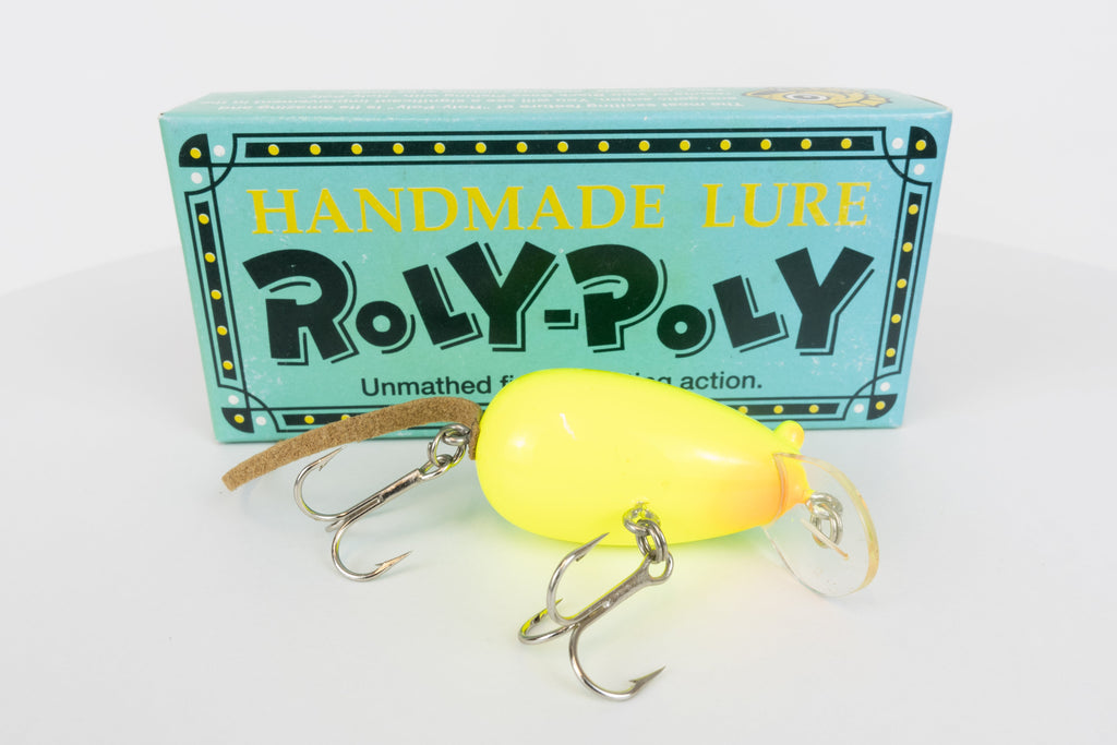 Roly-Poly - Handmade Japanese surface crankbait - Chartreuse colour, belly view of fishing lure with box in background