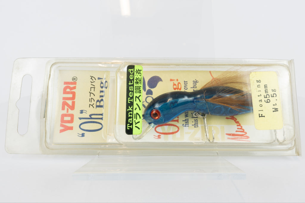 Yo-Zuri Slavko Bug - Clear Blue, vintage Japanese fishing lure, new in original packaging, front view. 