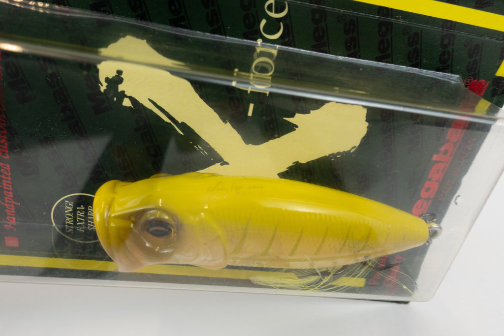 Megabass Baby Pop-X - 2012 - Modena Bone OB, 2012 stamped model in original packaging, stamp close up view. 