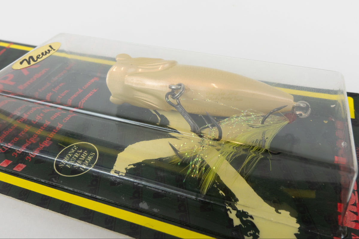 Megabass Baby Pop-X - 2012 - Tonosama Frog, 2012 stamped model in original packaging, lure stamp close up view. 
