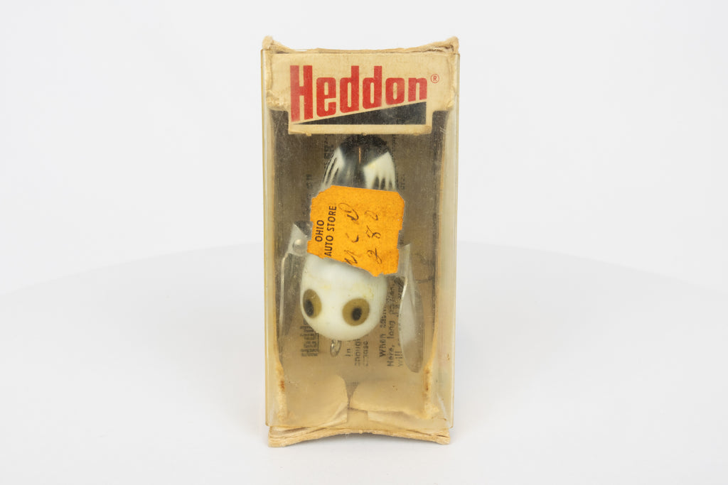 Heddon Tiny Crazy Crawler - BWH (Black, White Head) - Vintage lure in original packaging. View of lure inside packaging. 