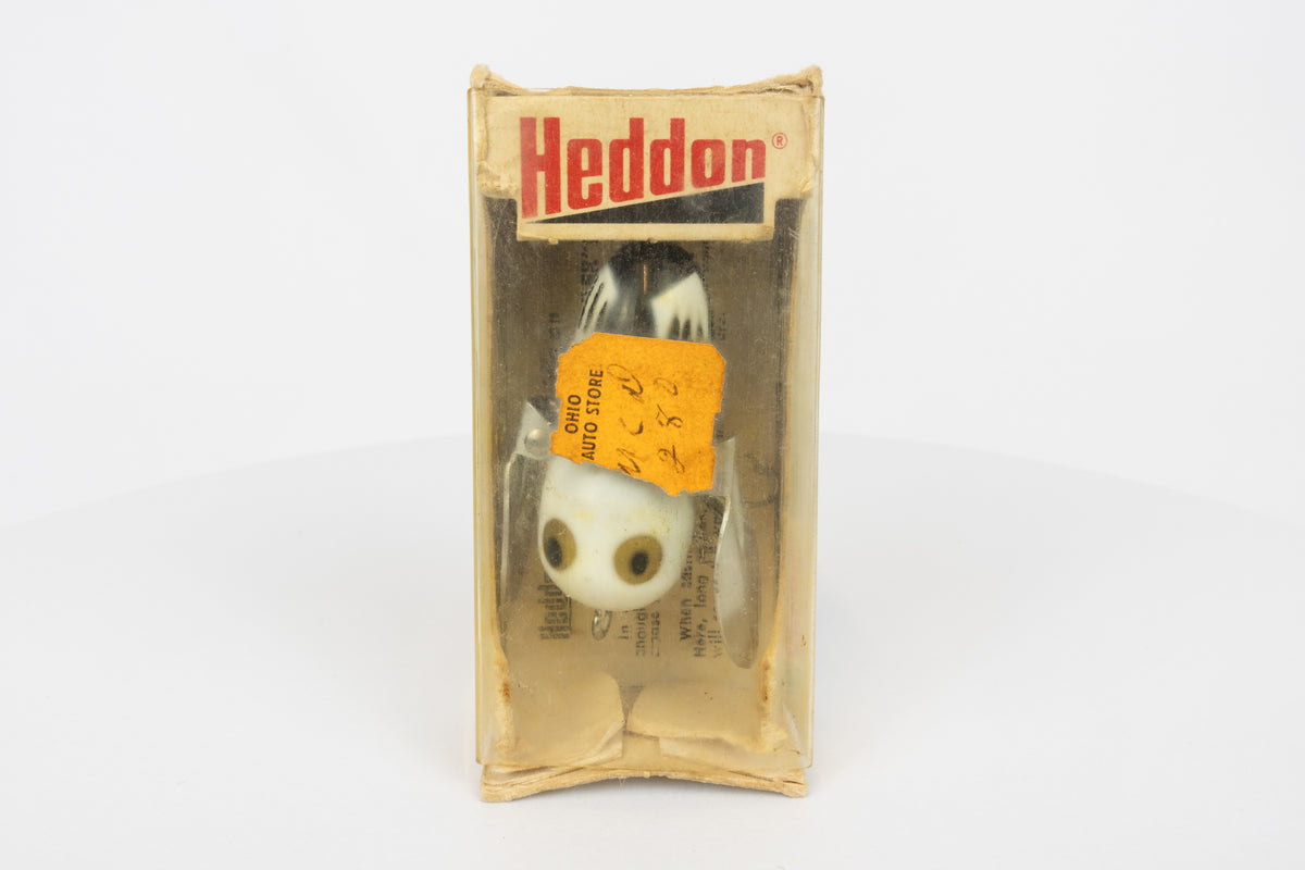 Heddon Tiny Crazy Crawler - BWH (Black, White Head) - Vintage lure in original packaging. View of lure inside packaging. 
