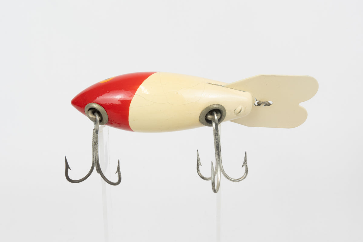 Bomber Bait Co. Bomber - vintage American fishing lure, near new condition in original packaging (aged), belly view of lure.