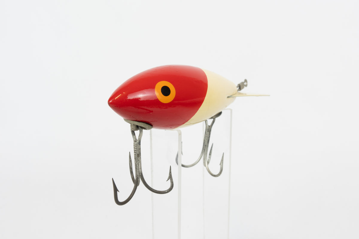 Bomber Bait Co. Bomber - vintage American fishing lure, near new condition in original packaging (aged), close up front view of lure.