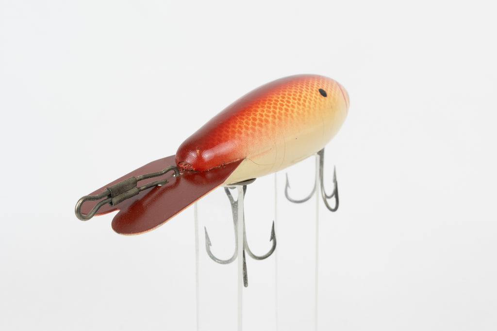 Bomber Bait Co. Bomber 500 series - 518 - vintage American fishing lure, near new condition in original packaging (aged),  front close view of lure.