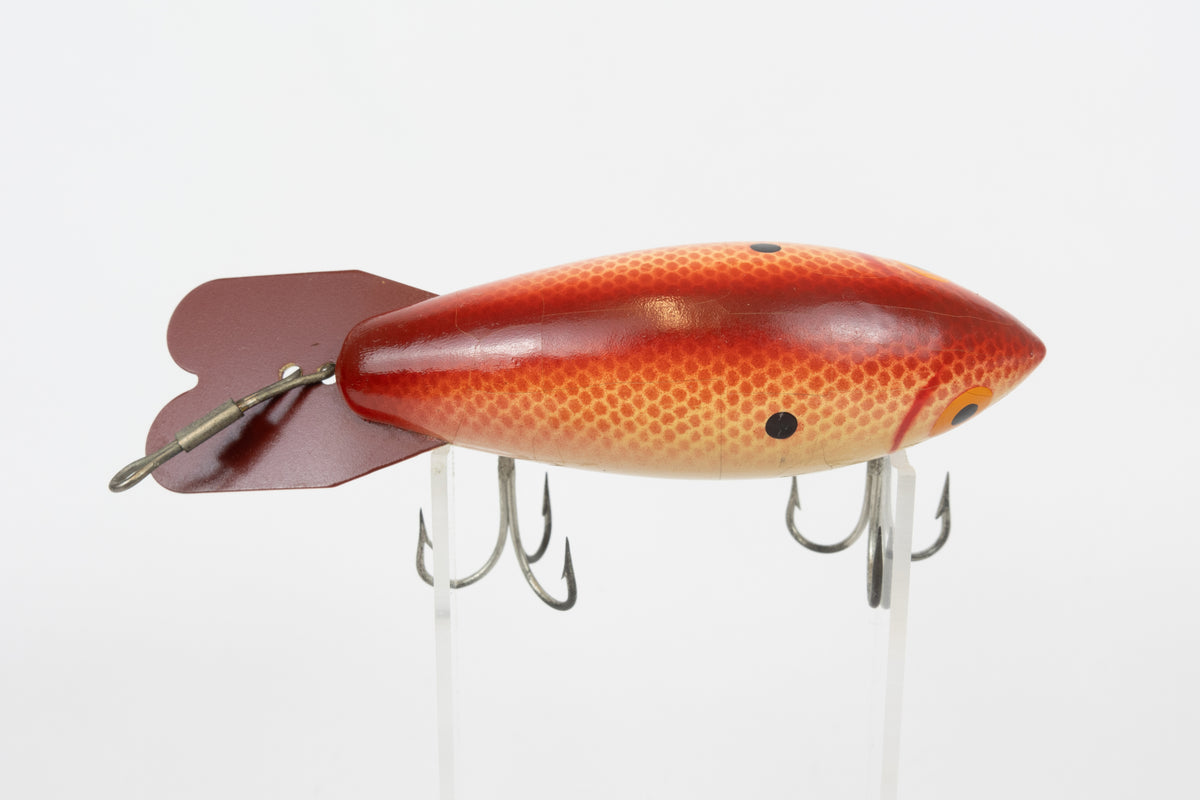Bomber Bait Co. Bomber 500 series - 518 - vintage American fishing lure, near new condition in original packaging (aged),  top view of lure.