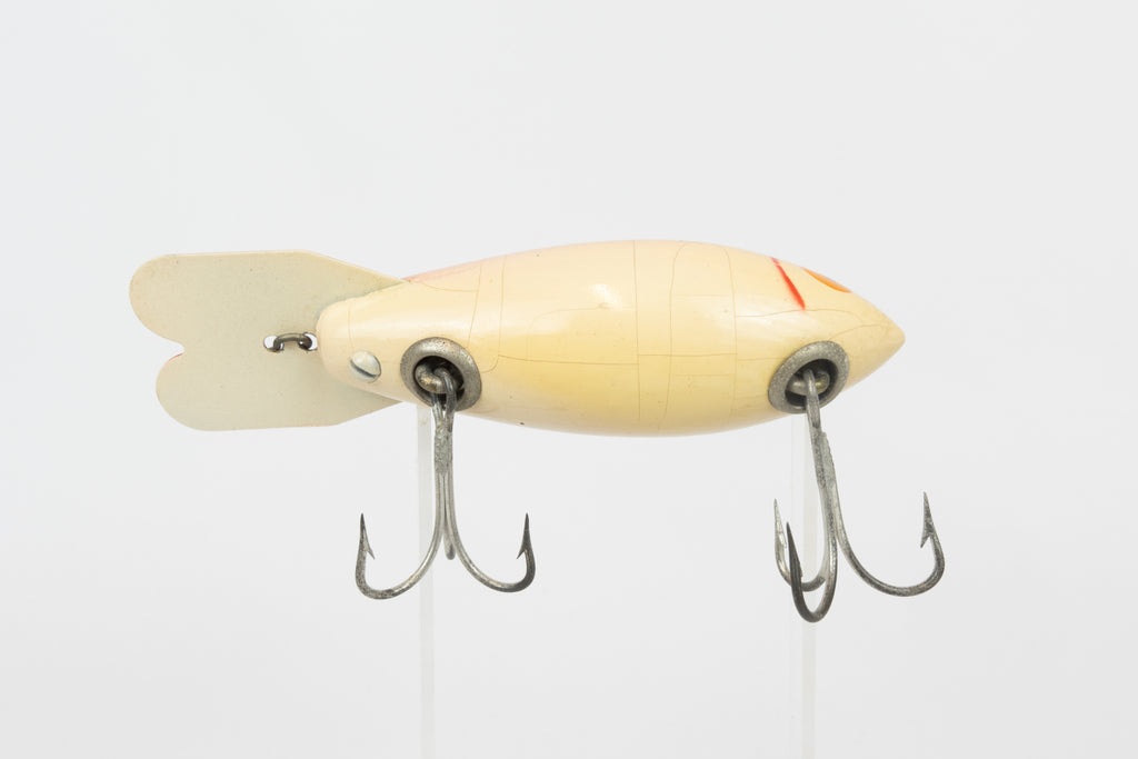 Bomber Bait Co. Bomber 500 series - 518 - vintage American fishing lure, near new condition in original packaging (aged), belly view of lure.