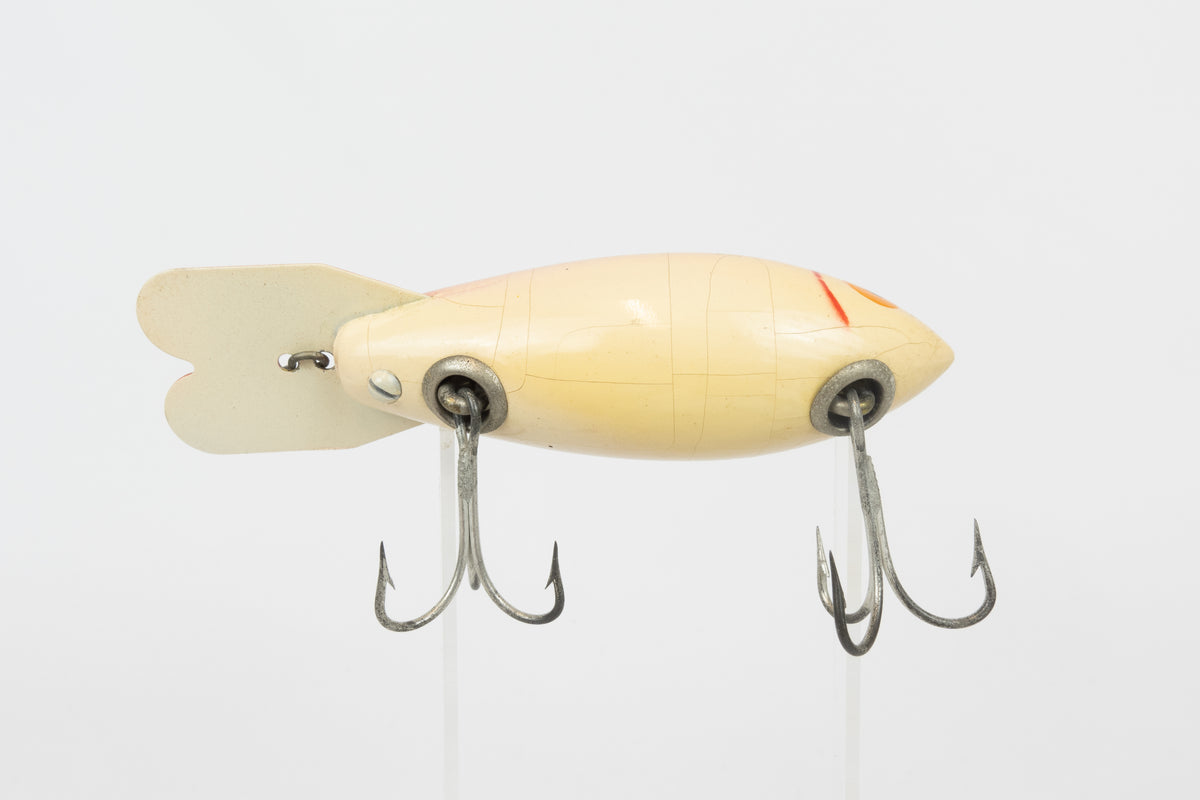 Bomber Bait Co. Bomber 500 series - 518 - vintage American fishing lure, near new condition in original packaging (aged), belly view of lure.
