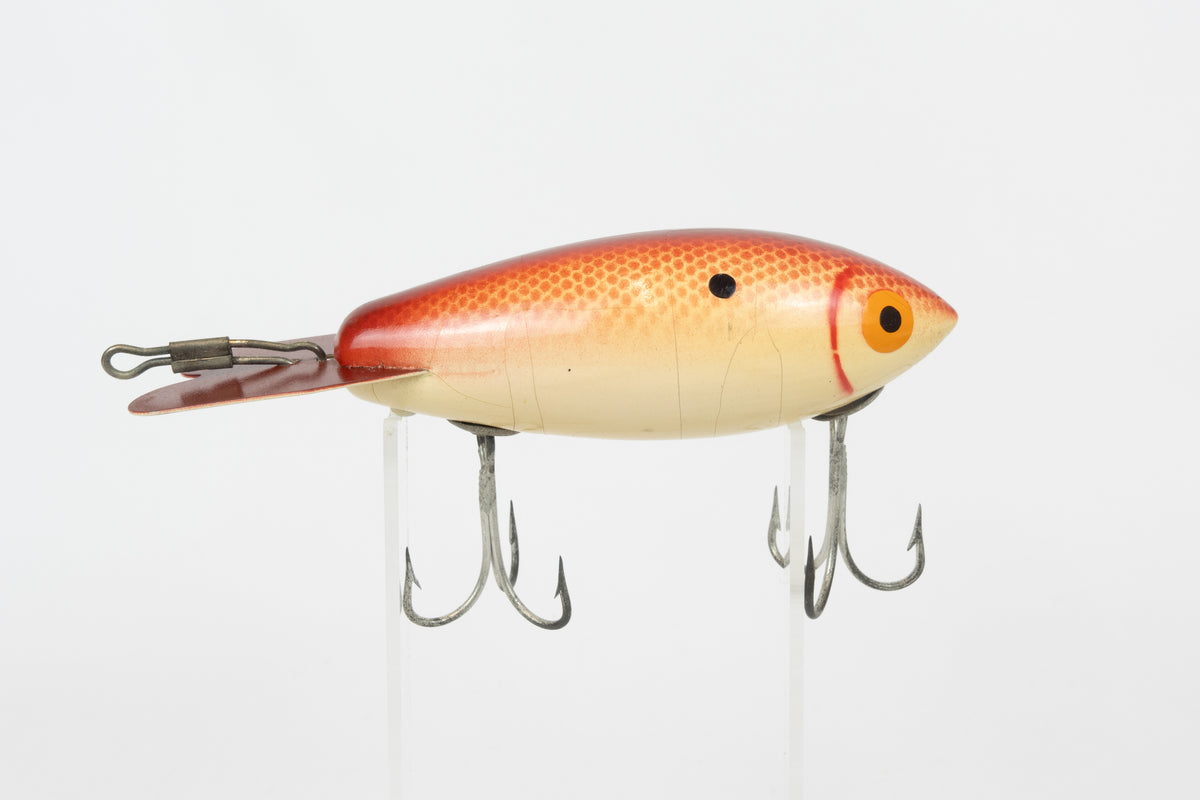 Bomber Bait Co. Bomber 500 series - 518 - vintage American fishing lure, near new condition in original packaging (aged),  right side view of lure.