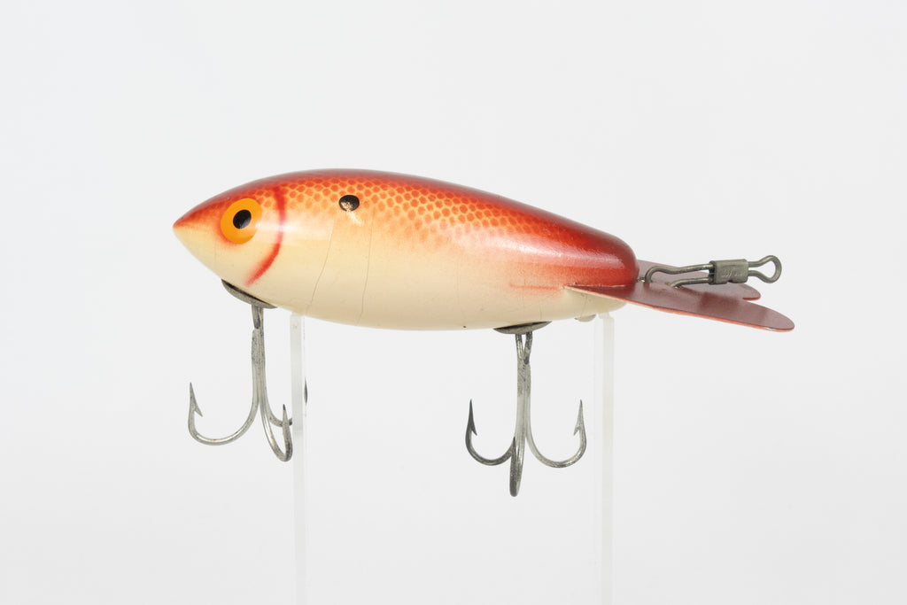 Bomber Bait Co. Bomber 500 series - 518 - vintage American fishing lure, near new condition in original packaging (aged), left side view of lure.