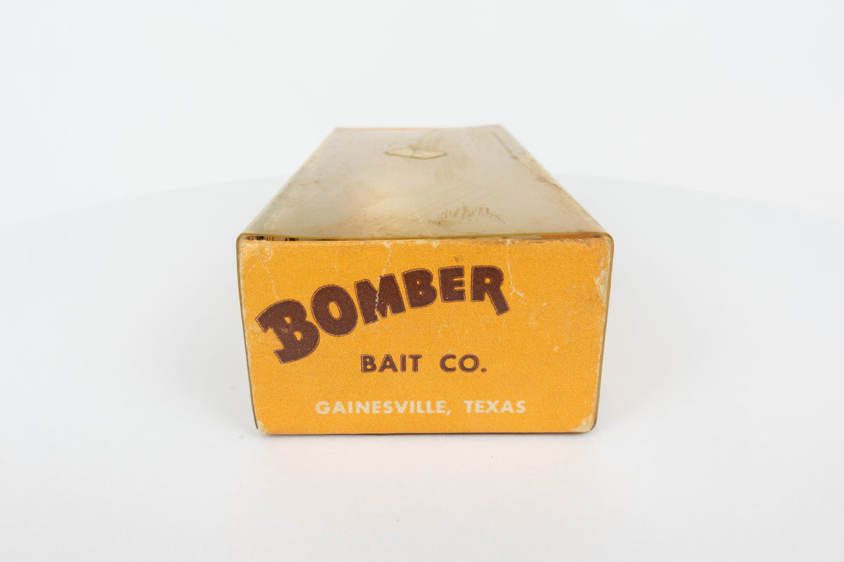 Bomber Bait Co. Bomber 500 series - 518 - vintage American fishing lure, near new condition in original packaging (aged), end view of lure box.