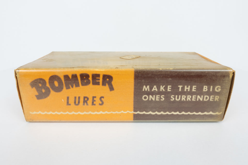 Bomber Bait Co. Bomber 500 series - 518 - vintage American fishing lure, near new condition in original packaging (aged), side view of lure box.