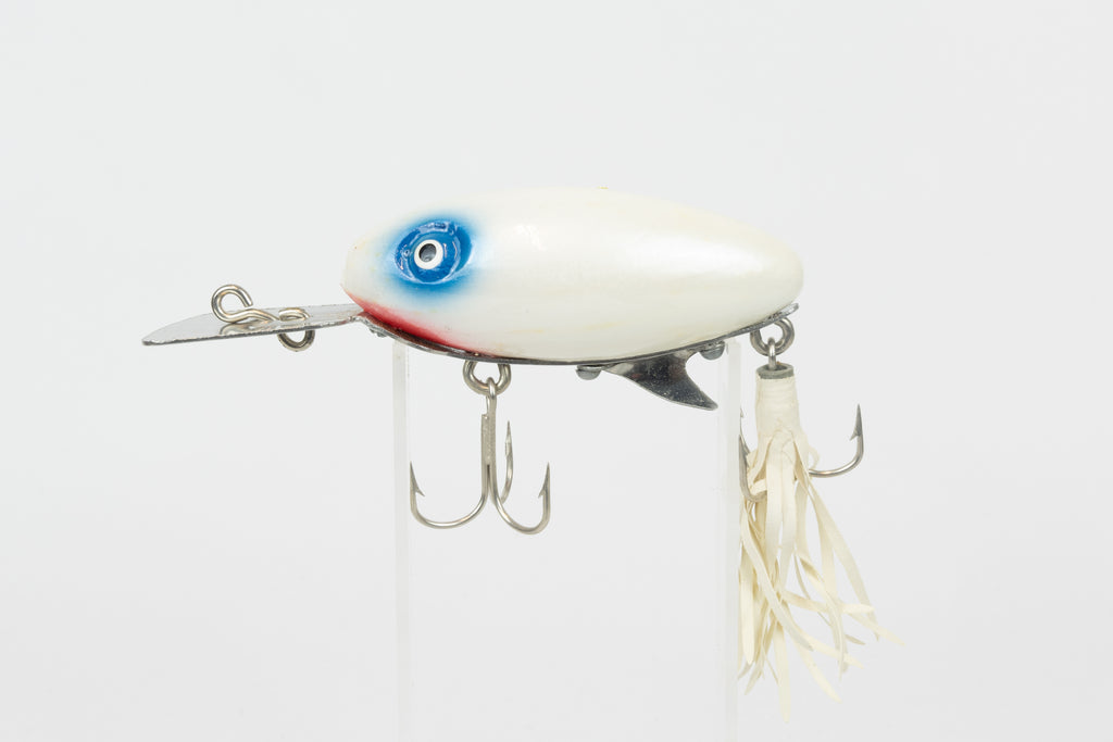 Strike King Super Scout 1/2oz. (Wood) - vintage American fishing lure, as new in original packaging (damaged), left side view of lure on stand.