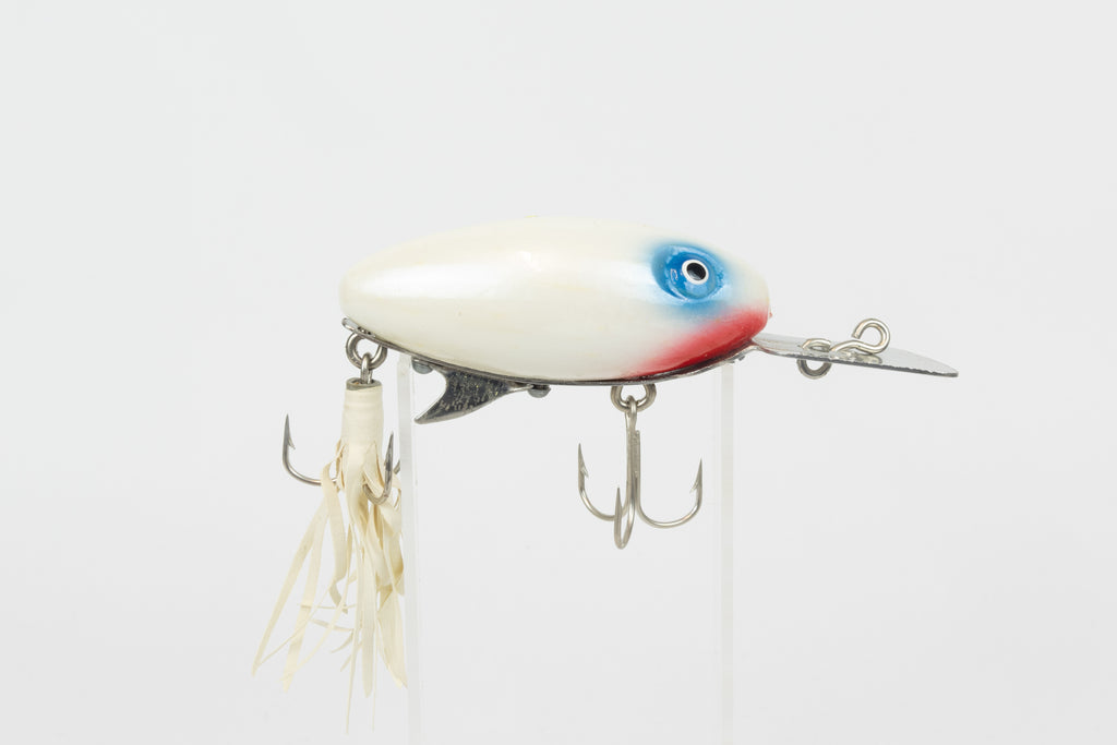 Strike King Super Scout 1/2oz. (Wood) - vintage American fishing lure, as new in original packaging (damaged), right side view of lure on stand.
