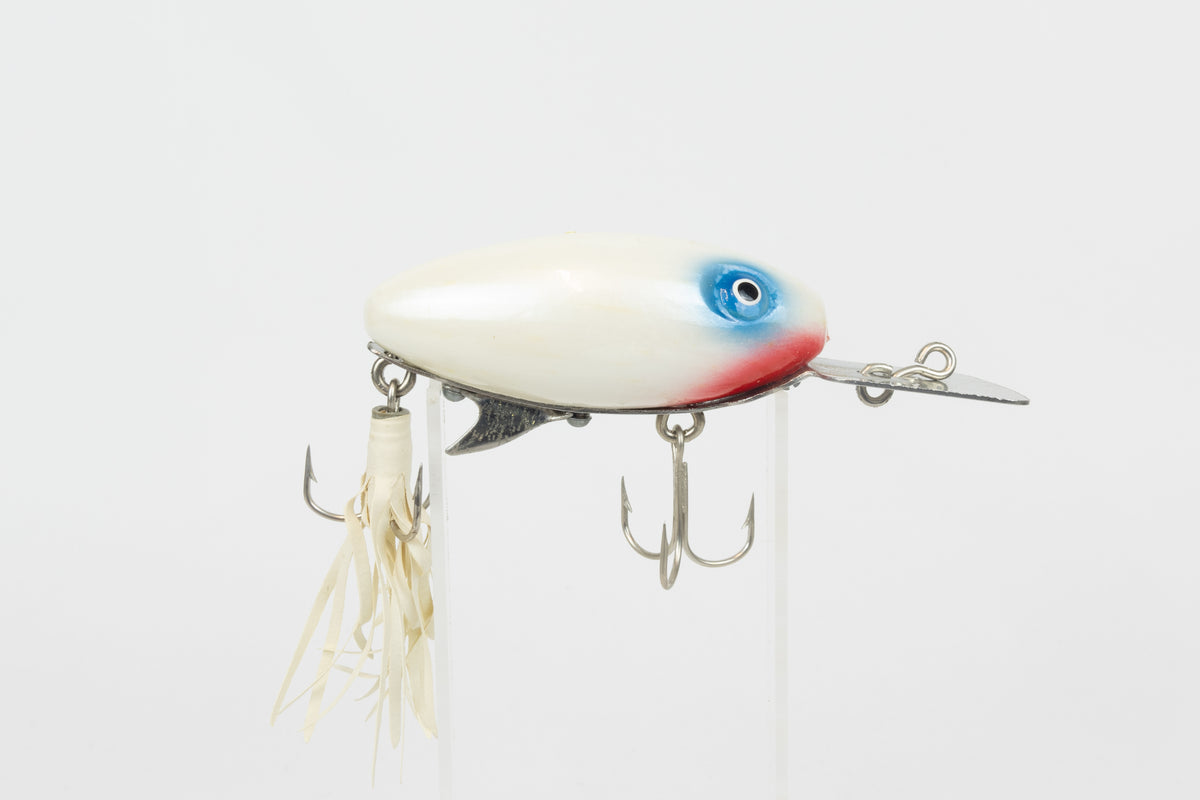 Strike King Super Scout 1/2oz. (Wood) - vintage American fishing lure, as new in original packaging (damaged), right side view of lure on stand.